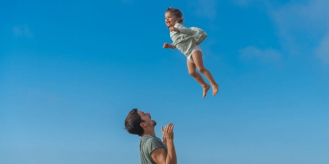 a father learning to enjoy parenthood more with his kid
