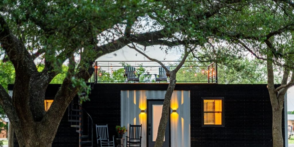 container house with rooftop deck that contributes to the tiny house divorce rate